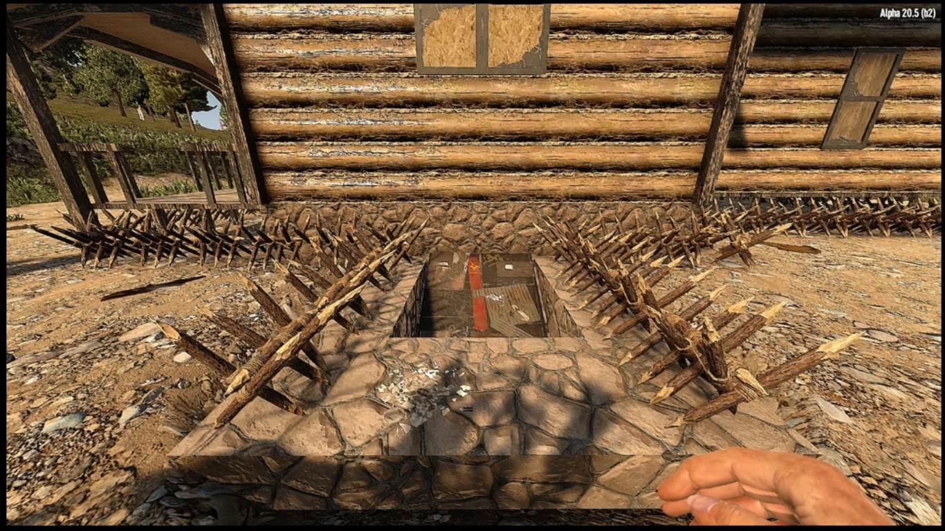 Trap setup in 7 Days to Die: spikes, electric fence posts, and blade traps